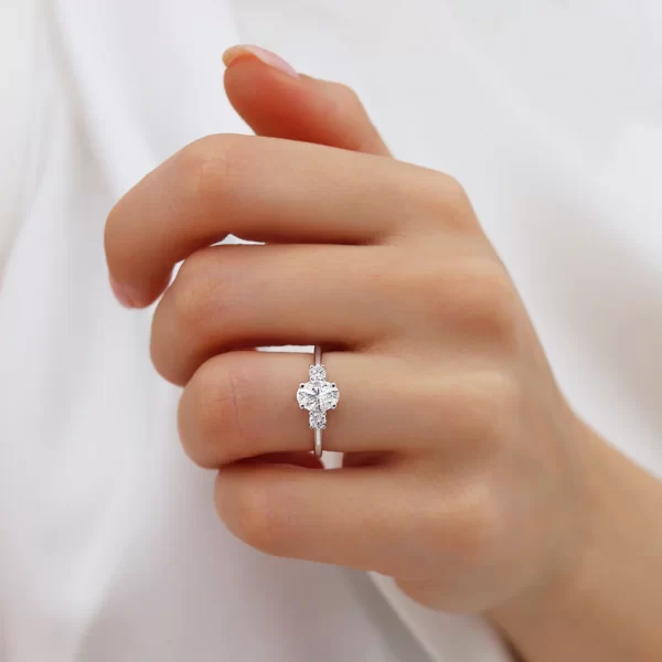 LOUELLA Moissanite Oval Petite Trilogy Engagement Ring 18k White Gold - Image 6
